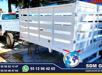 Fabricantes de Cajas Secas para camionetas y camiones Ford Nissan RAM Chevrolet Hino Foton Izusu Hyundai International Mercedez Benz Freightliner Volvo Man VW modelos 2024, 2025 SDM Global Mexico somos una empresa líder como fabricantes de Cajas Secas redilas, estaquitas y carrocerias, semi remolques, plataformas, con personal altamente capasitado para su fabricacion.En México, las Cajas Secas redilas o estaquitas son estructuras metálicas o de madera que se montan en la parte trasera de las camionetas de carga para aumentar su capacidad de transporte. Las cajsa secas redilas o estaquitas pueden tener lados abatibles o desmontables, lo que facilita la carga y descarga de mercancías cajas secas venta de carrocerias Fabricantes de Cajas Secas para camionetas y camiones Ford Nissan RAM Chevrolet Hino Foton Izusu Hyundai International Mercedez Benz Freightliner Volvo Man VW modelos 2024, 2025 SDM Global Mexico somos una empresa líder como fabricantes de Cajas Secas redilas, estaquitas y carrocerias, semi remolques, plataformas, con personal altamente capasitado para su fabricacion.En México, las Cajas Secas redilas o estaquitas son estructuras metálicas o de madera que se montan en la parte trasera de las camionetas de carga para aumentar su capacidad de transporte. Las cajsa secas redilas o estaquitas pueden tener lados abatibles o desmontables, lo que facilita la carga y descarga de mercancías cajas secas venta de carrocerias